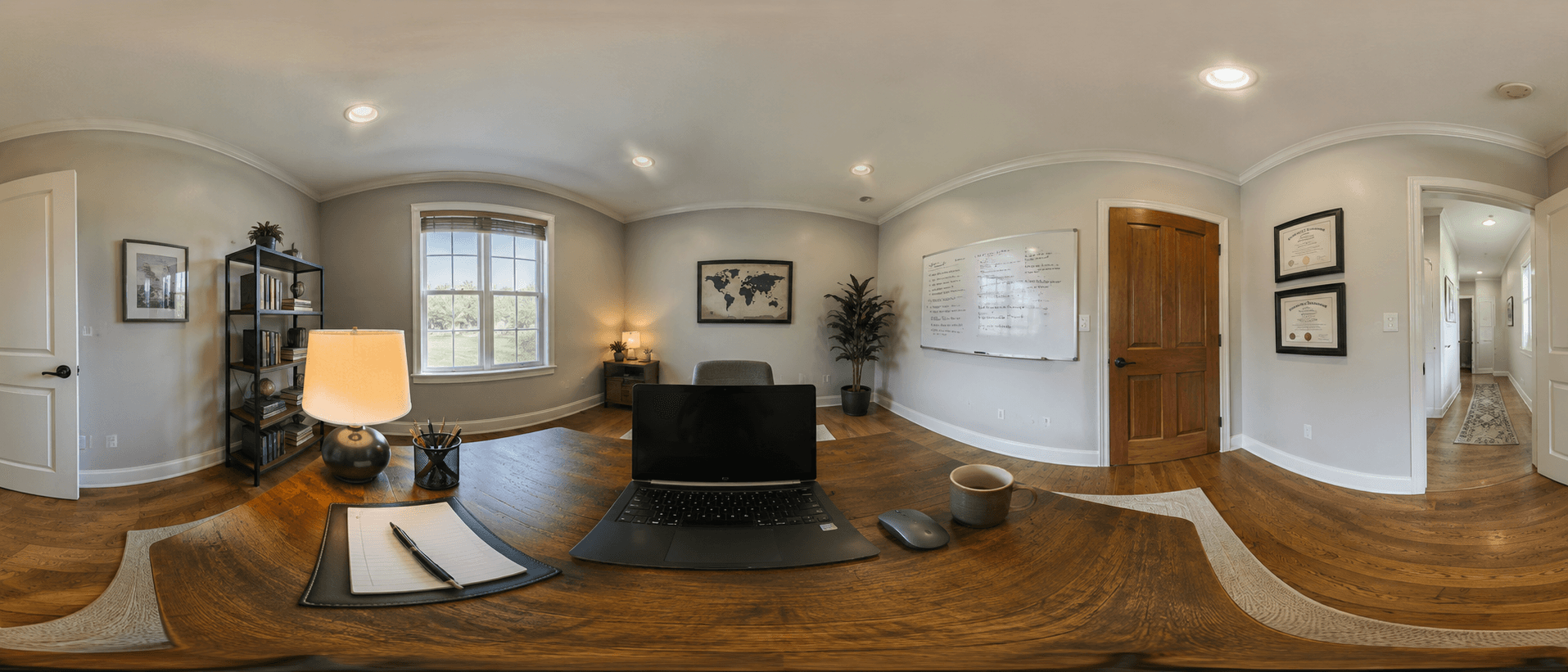 360-degree panoramic capture of a student's home office, showing the desk, laptop, and every wall of the room in a single frame